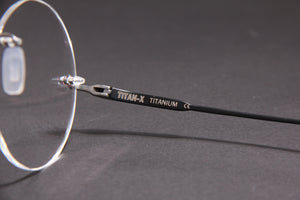 TITAN-X NUKE TITANIUM GUN MATTE BLACK CIRCLE RIMLESS PRESCRIPTION EYEGLASSES SPECTACLES