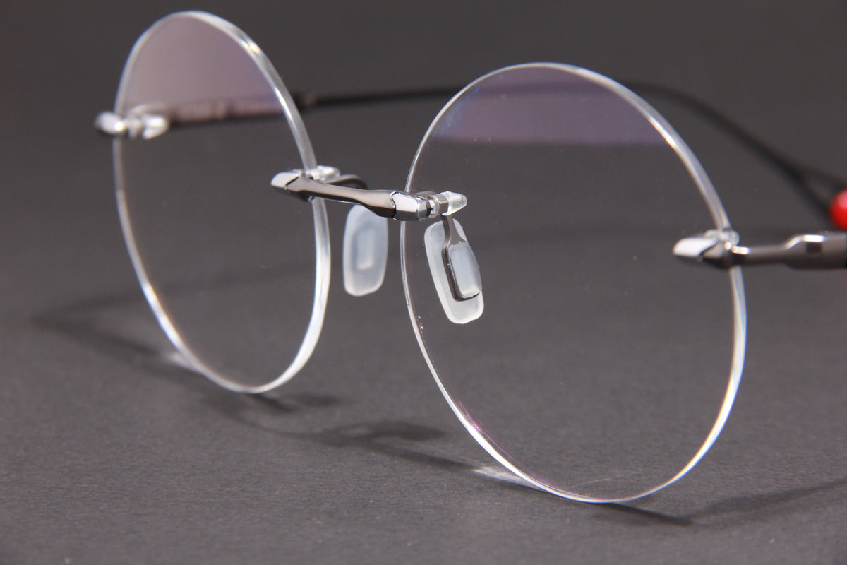 TITAN-X NUKE TITANIUM GUN MATTE BLACK CIRCLE RIMLESS PRESCRIPTION EYEGLASSES SPECTACLES